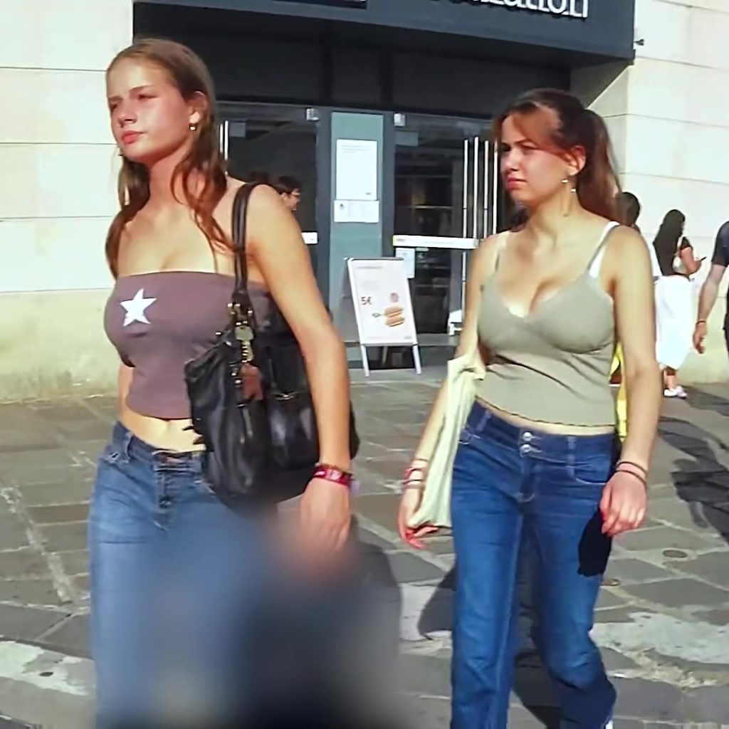 Two candid busty babes with tits bouncing as they walk - Candid Best